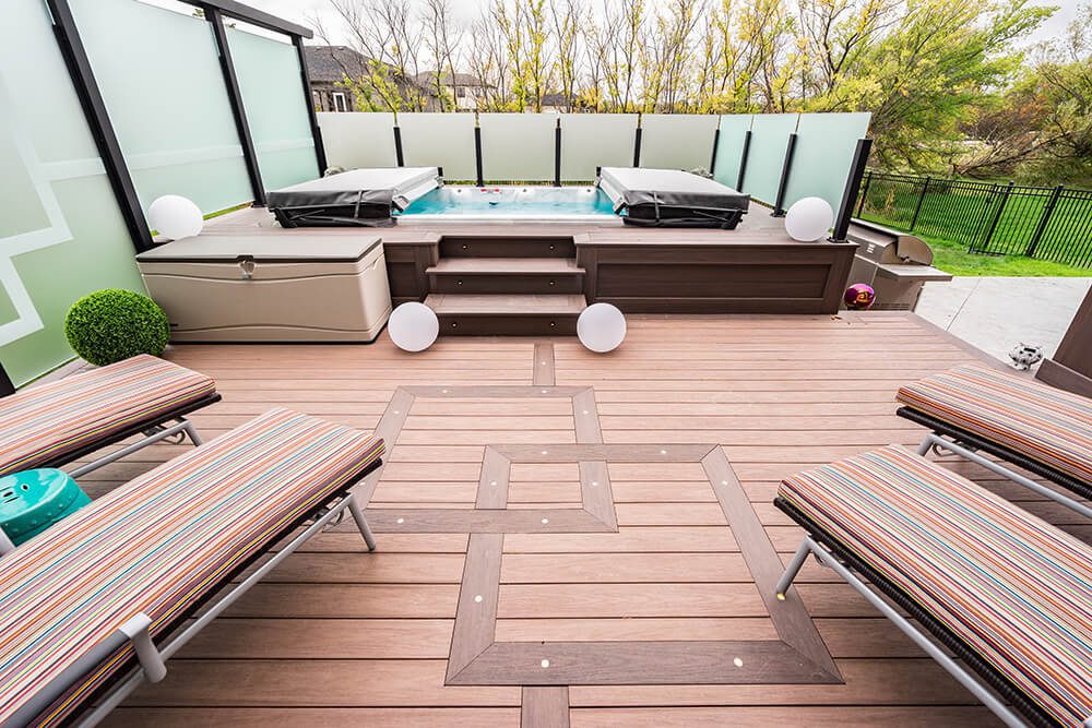 Wolf PVC Serenity Decking, with 12mm tempered glass railing in arbor